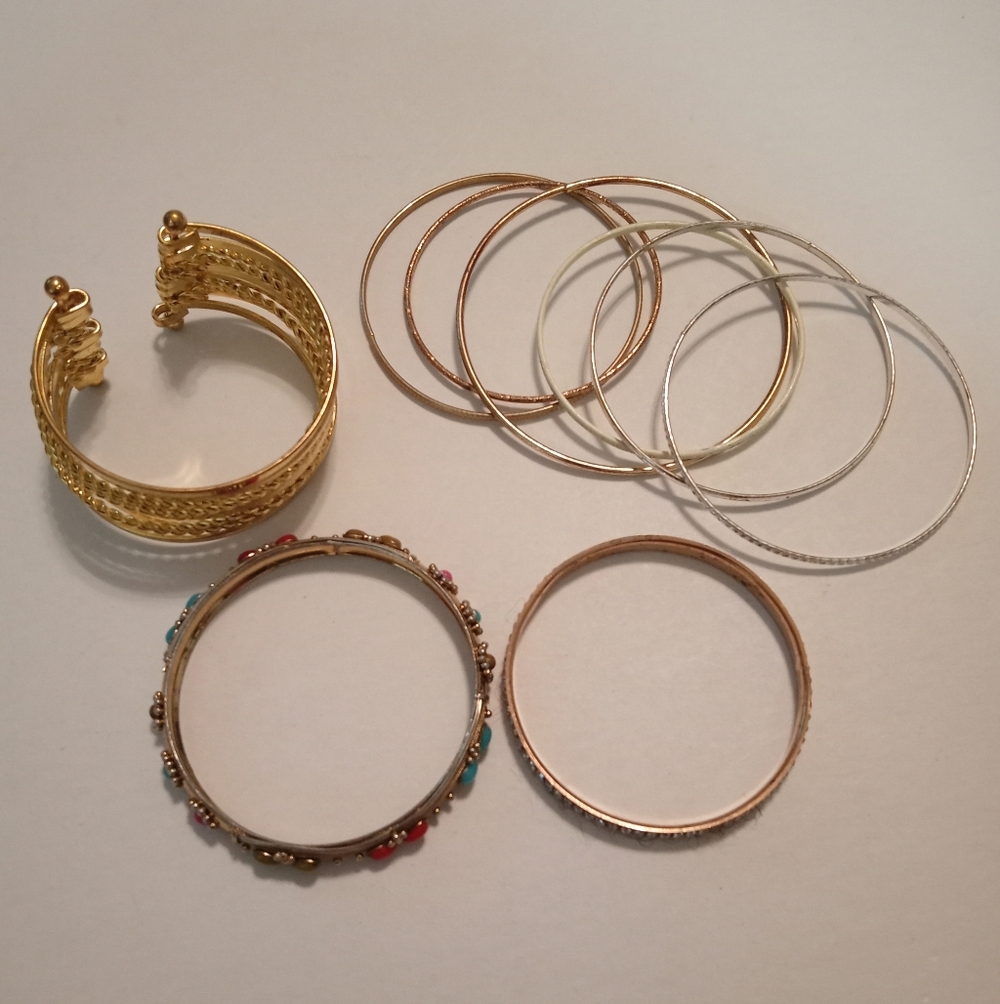 #404.  9 Piece Assorted Bracelet Bundle